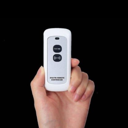 Slimline photoelectric smoke alarm remote with hand